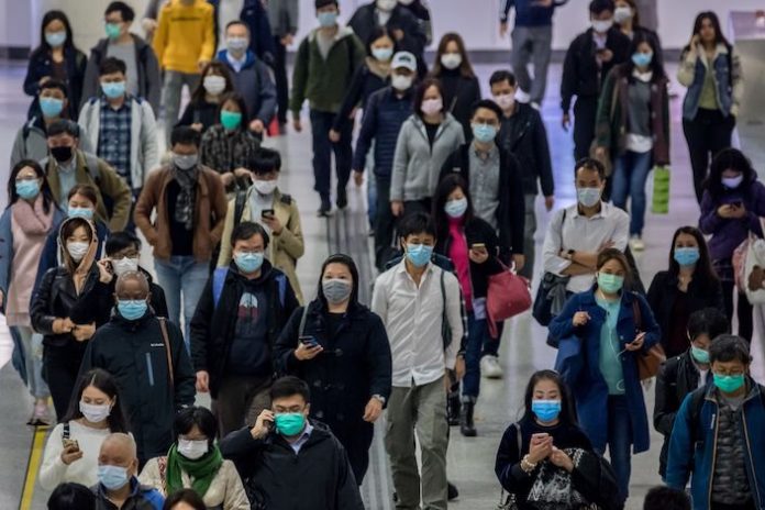 Hong Kong Commuters As Coronavirus Fears Linger